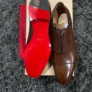 New Christian Louboutin Red bottoms mens.